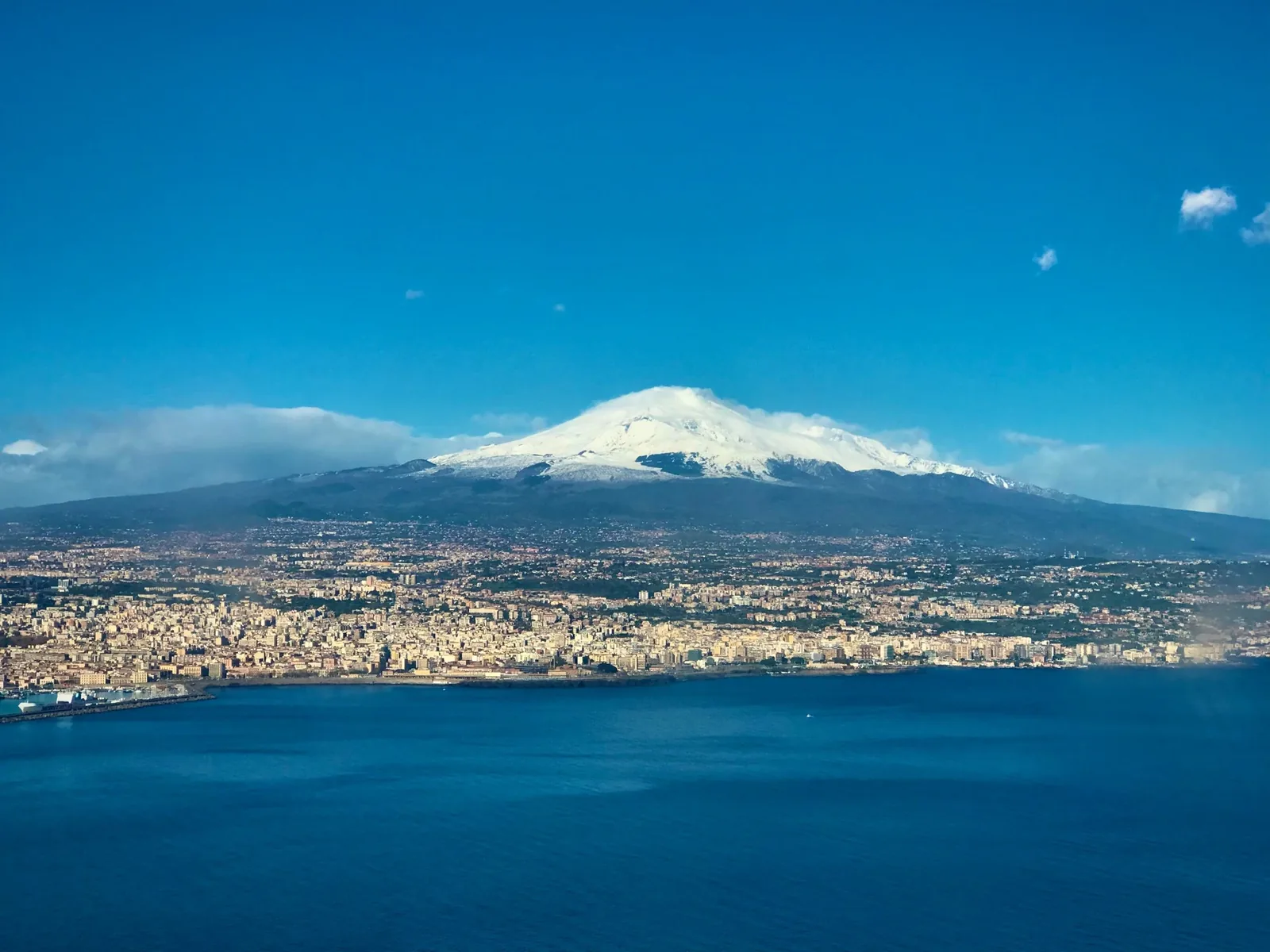 Mount Etna above Catania, seen from the sea